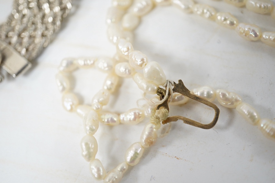 A modern 925 bracelet bearing the word 'Tiffany', together with a freshwater pearl necklace with 9ct gold clasp, a white metal mesh link necklace, a Danish 925 pendant on chain and seven other items including a lady's 9c